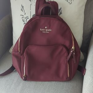Kate Spade Deep Red Backpack with Gold Accents